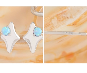 Detailed view of S925 sterling silver stamp on blue opal star stud earrings