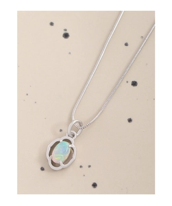 Macro shot of silver S925 necklace with iridescent opal stone and snake chain detail