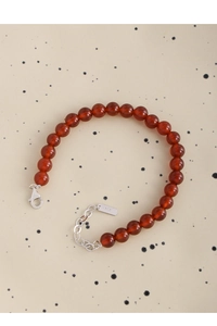 Detailed view of S925 sterling silver lobster clasp and red agate beads on bracelet