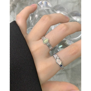 S925 sterling silver ring with green opal stone and wave pattern in minimalist style