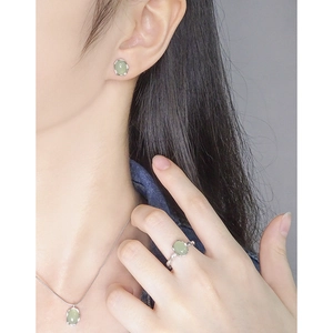 Minimalist S925 silver jewelry set with oval green crystals including earrings and necklace