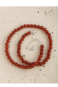 Detail of red agate bead necklace with S925 sterling silver lobster clasp and extender