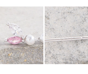 Macro detail of S925 sterling silver stamp and zirconia pearl earring craftsmanship