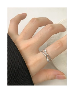 Detailed view of S925 sterling silver double-layer knotted open ring worn on finger