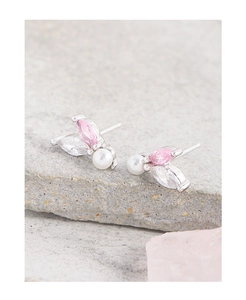 Detail view of S925 silver stud earrings with pink marquise zircon and pearl butterfly design