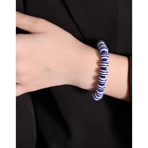 Elegant navy blue and white striped S925 silver beaded bracelet for women on wrist