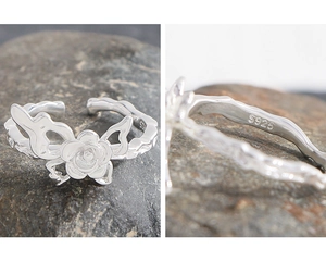 Detailed view of S925 sterling silver stamp and flower texture on the adjustable ring