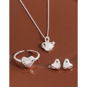 S925 sterling silver heart jewelry set with necklace ring and earrings on a tray