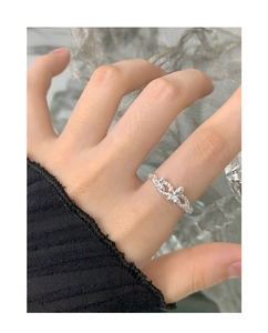 Detail of S925 sterling silver butterfly ring with delicate twisted texture on band