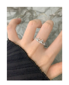Close-up of S925 sterling silver butterfly flower ring with wrinkled texture design