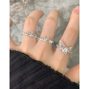 S925 sterling silver stacked ring set with textured floral and butterfly motifs