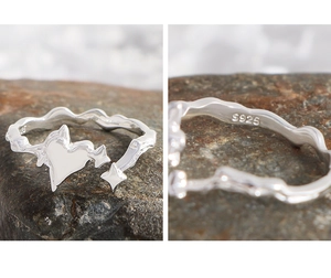 Close-up of S925 sterling silver hallmark on the wavy band of this heart star ring