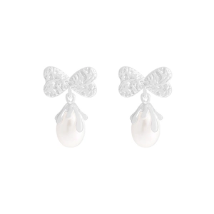 S925 silver bow stud earrings with natural pearl drops in a minimalist luxury design