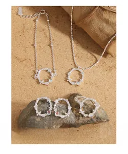 Detailed set of S925 sterling silver butterfly and flower jewelry with moonstone