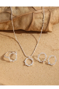 Detail view of S925 silver jewelry set featuring blue moonstone and flower design