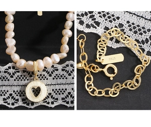 Detail of S925 sterling silver clasp and baroque pearl necklace with heart charm