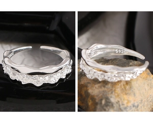 Macro shot of S925 sterling silver ring showing double-layer texture and hallmark