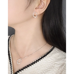 S925 silver jewelry set with hollow rings, pink stones and diamonds on female model