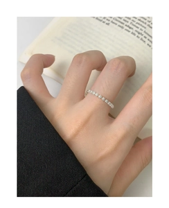 Detail of S925 sterling silver floral ring showing a delicate beaded flower pattern