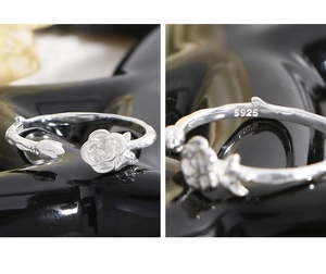 Detail view of S925 sterling silver rose bud ring showing intricate plant vine texture