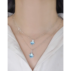 Collier double couche en argent S925 avec breloque cœur et pendentifs en cristal bleu