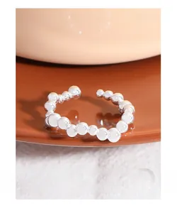 Macro shot of S925 sterling silver ring with irregular round beads and bubble design
