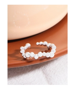 Detailed close-up of S925 sterling silver ring featuring irregular polished metal beads