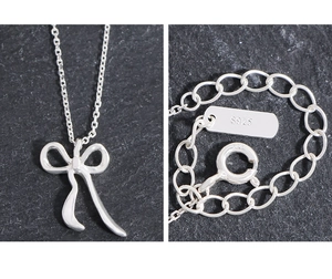Détail du collier noeud en argent massif S925 avec poinçon et sa chaîne d'extension