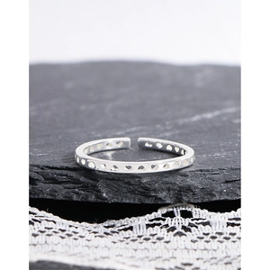 Minimalist S925 sterling silver open ring featuring a delicate hollow heart design pattern