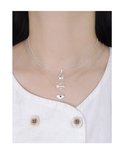 Three-layer S925 sterling silver necklace featuring hollow star, arrow, and heart pendants