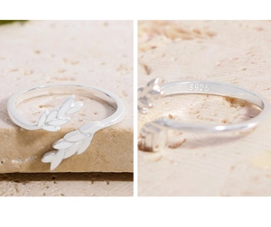 Macro shot of S925 sterling silver stamp and wheat leaf pattern on adjustable ring