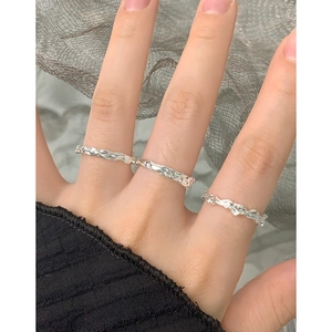 Three-piece set of S925 sterling silver rings with liquid lava texture on hand
