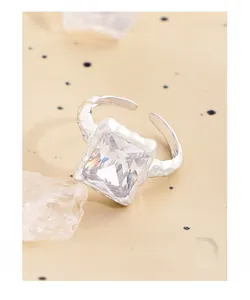 Macro view of S925 silver ring featuring lava texture and square zircon stone