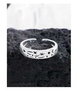 Detailed view of S925 sterling silver ring with engraved star and moon patterns