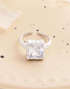 Macro shot of S925 sterling silver ring featuring lava texture and square zircon stone