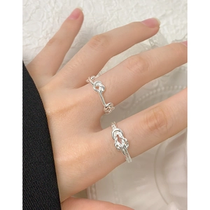 Minimalist S925 sterling silver twisted knot rings with a polished adjustable open design
