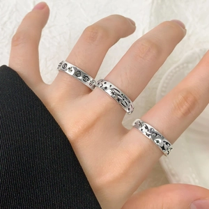 Three-piece S925 silver ring set with engraved graffiti icons on hands, retro style