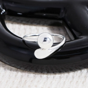 Polished S925 sterling silver open ring featuring a geometric ball and teardrop design