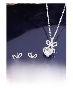 S925 sterling silver bow and heart moonstone necklace set with matching stud earrings