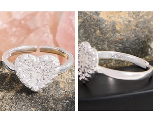 Macro shot of S925 sterling silver hallmark and lava texture on heart ring