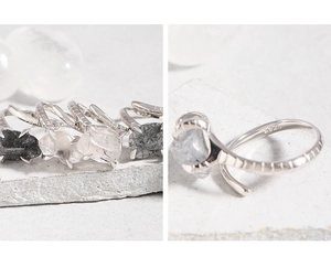 Detailed macro shot of S925 sterling silver stamp and natural black rutilated quartz