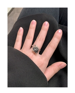 Detailed view of S925 silver snake ring with natural black rutilated quartz stone