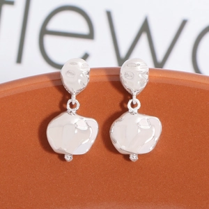Irregular textured S925 sterling silver earrings with a liquid metal meteorite design