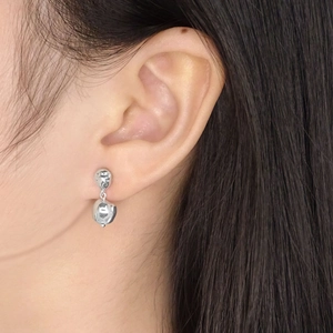 Elegant S925 sterling silver earrings with irregular meteorite liquid metal design