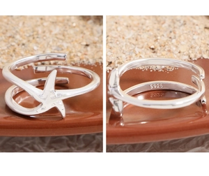 Detail of S925 sterling silver starfish ring showing the inner S925 hallmark and dual band