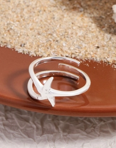 Macro shot of S925 sterling silver starfish ring showing the 925 authenticity hallmark