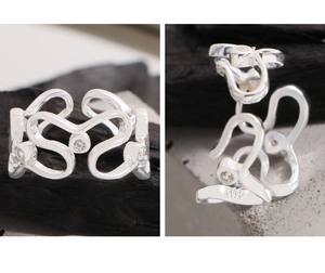 Makroansicht des S925 Sterling Silber Ringes mit Wellendesign und Zirkonia Steinen