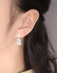 Detail shot of S925 sterling silver Christmas tree stud earrings with zircon stars