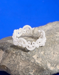 Detailed macro view showing the intricate woven texture of the S925 silver braided ring