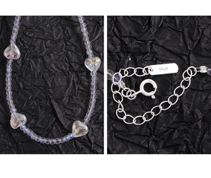 Macro shot of S925 hallmark on silver clasp with iridescent heart crystal beads